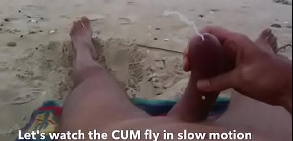  Curved cock wank and cum at nude beach